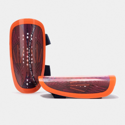 ESPINILLERAS ATTACK ROSA FLÚOR CORAL FLÚOR